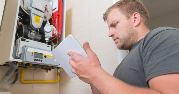 Boiler being serviced - stock